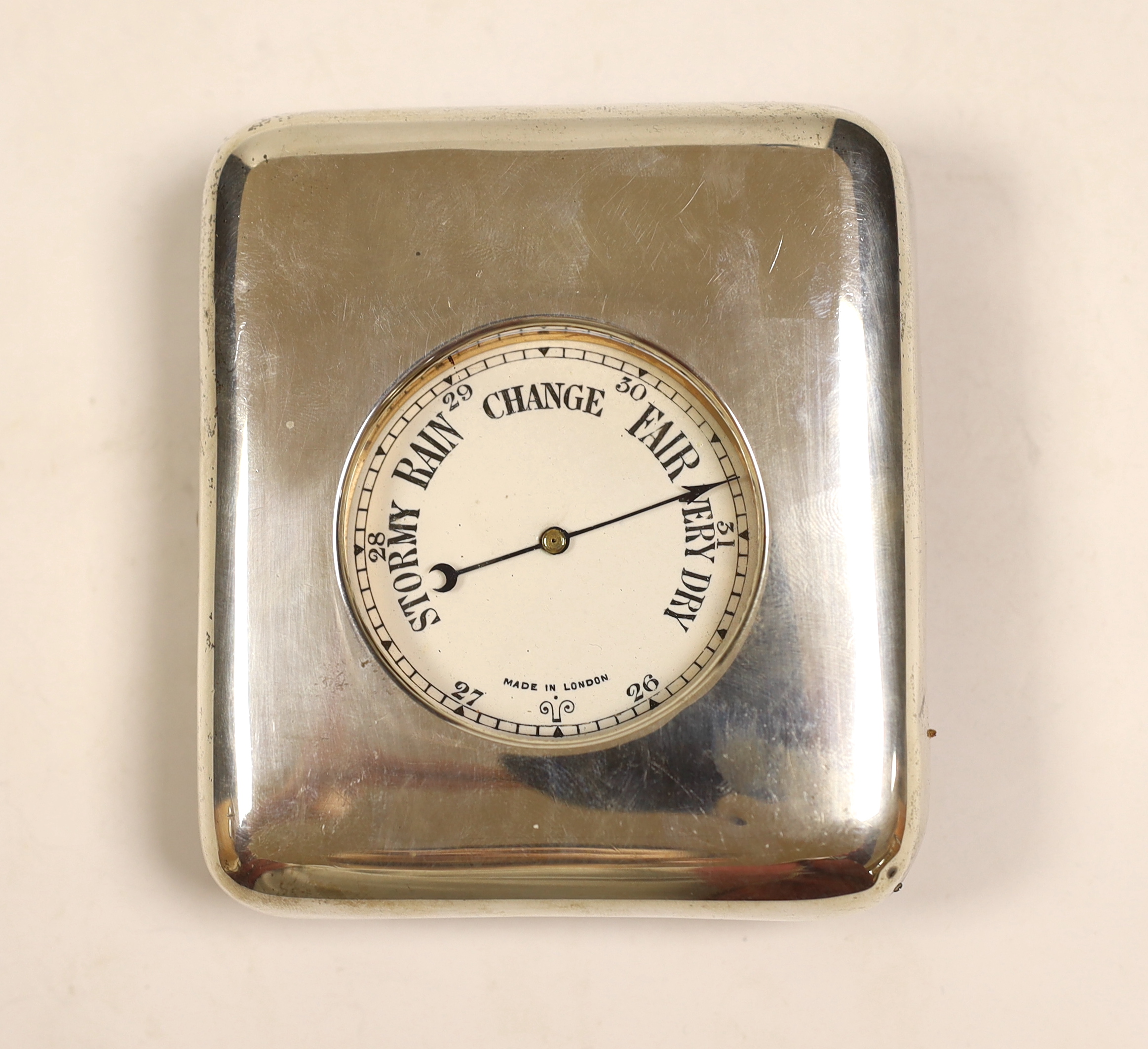 A nickel cased Goliath pocket barometer, in silver mounted travelling case, London, 1897, 11.1cm.